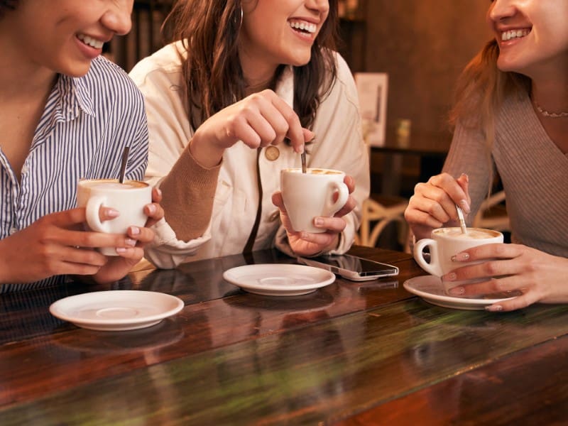 Friends enjoying coffee together.