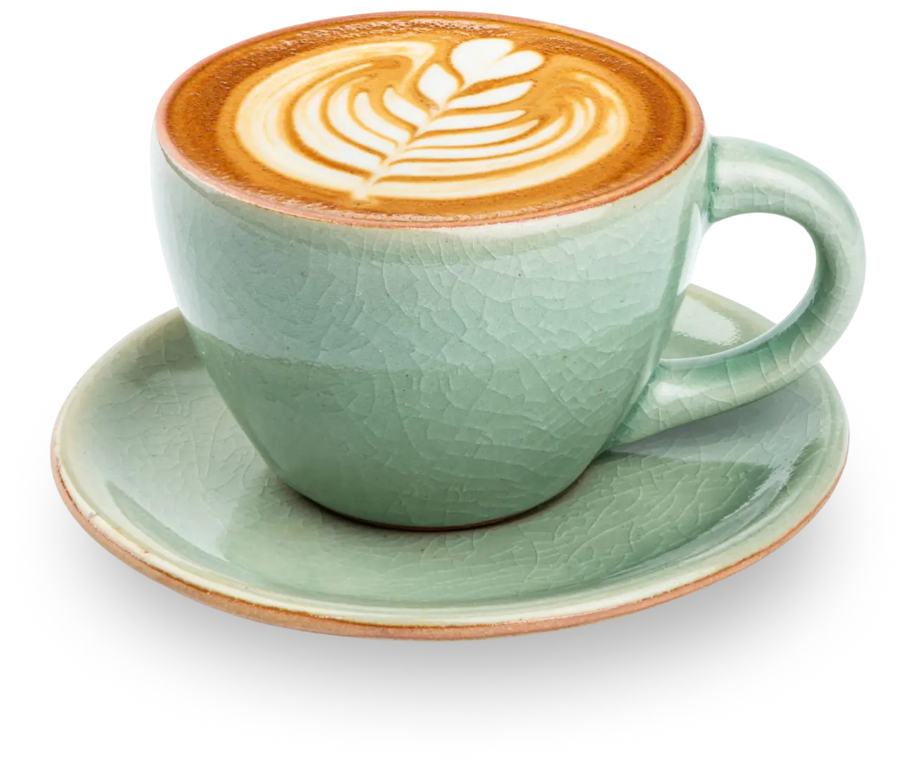 Latte art in a green cup and saucer.